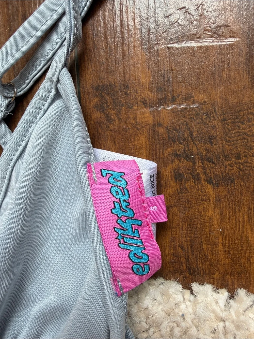 Edikted Light Blue Tie-Front Crop Tank with Pink Logo Tag